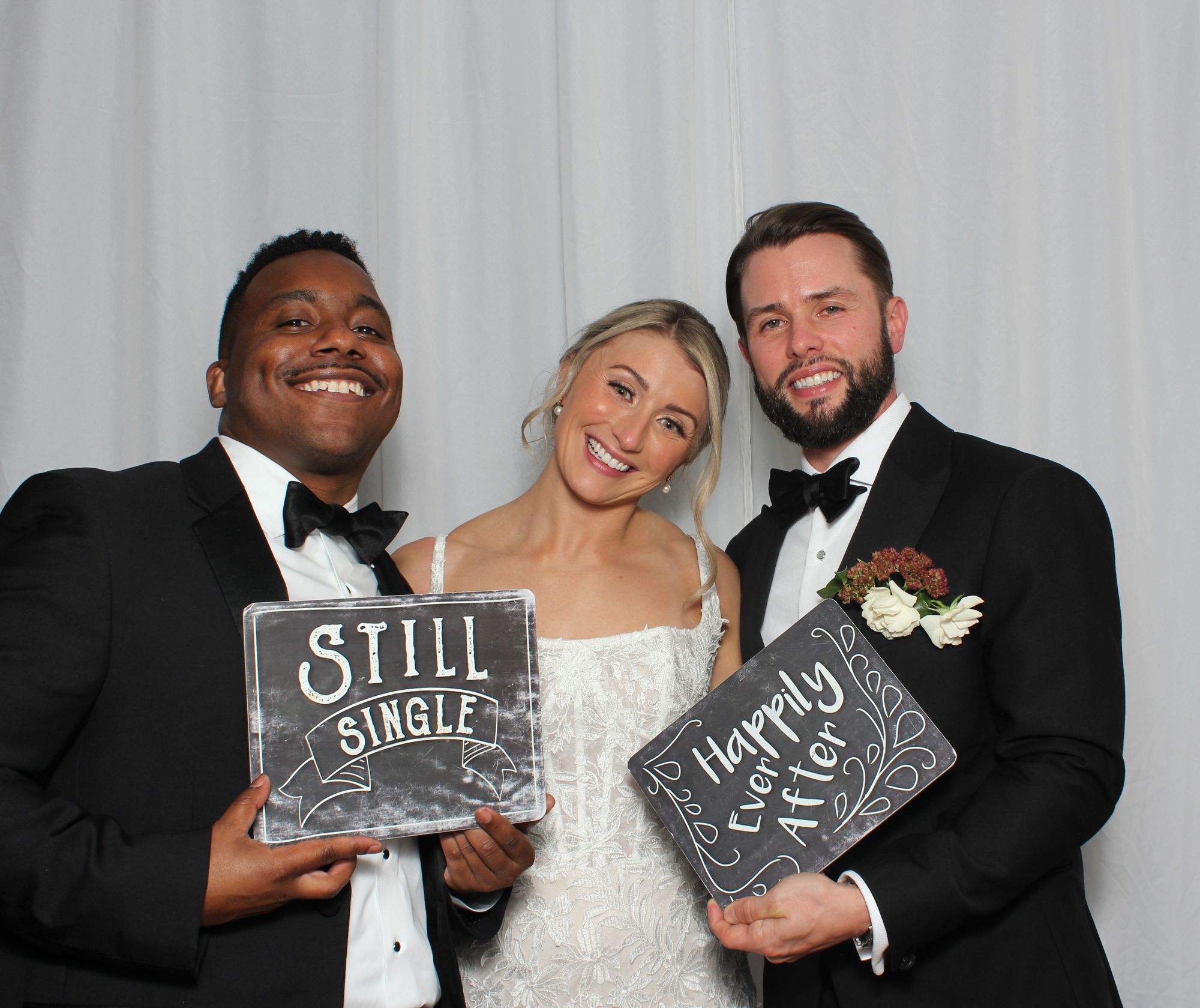 Oh Snap! Signature photo booth with backdrop and props